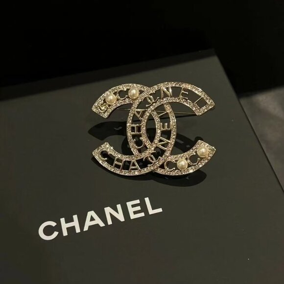 CHANEL Jewelry - Chanel pearl brooch